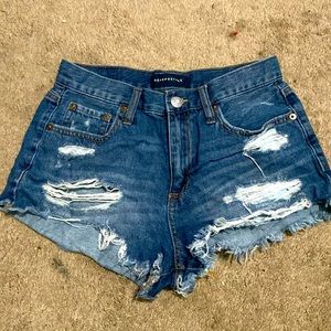 Dark washed jean ripped booty shorts, size 4